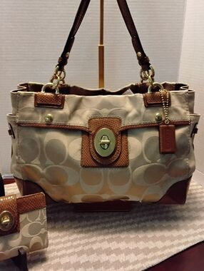 Coach Beige and Brown Signature Canvas Satchel.